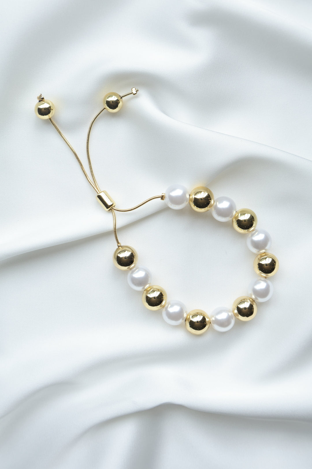 PULSERA PERLA BALIN DORADO 9MM
