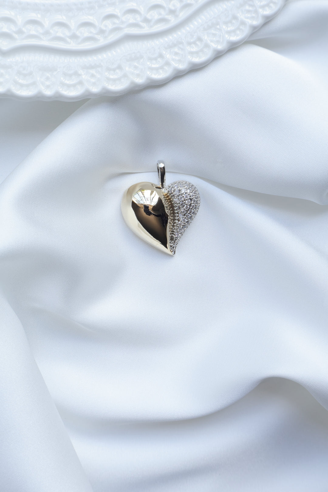 MEDIO CORAZON DORADO PLATA